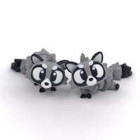 Big Eyed Raccoon